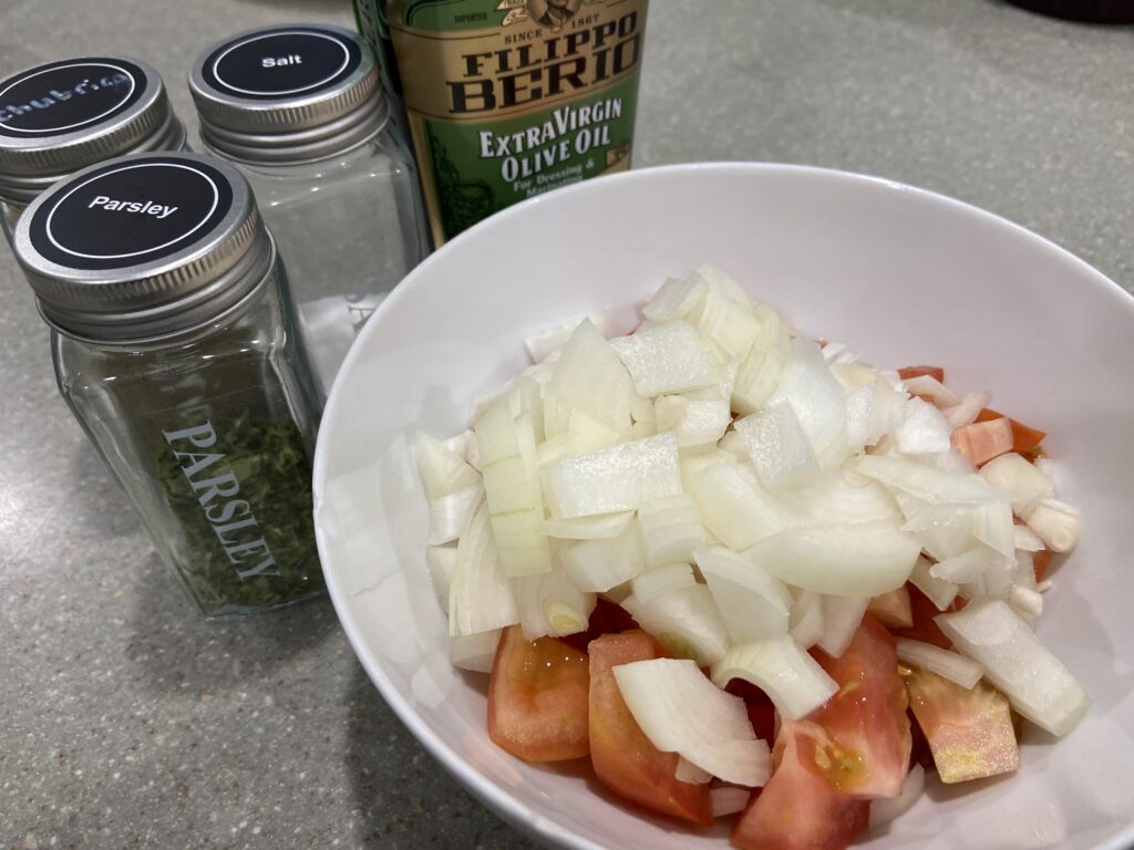 salmon, chopped onion, salt, pepper, and extra virgin olive oil