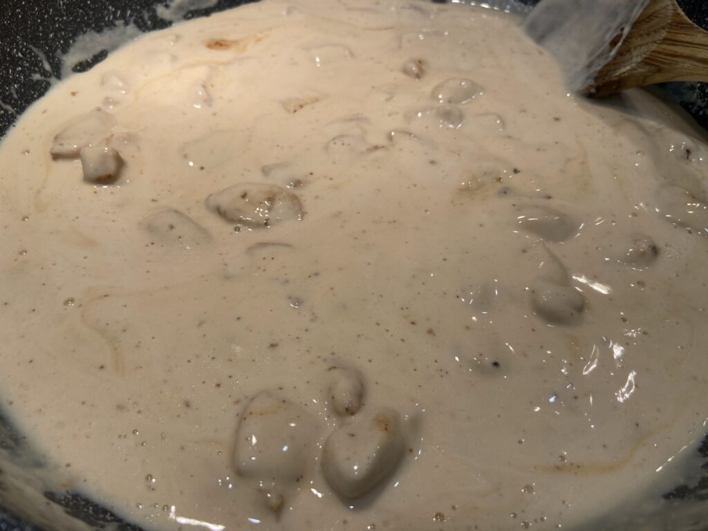 Sauteed chicken with alfredo sauce