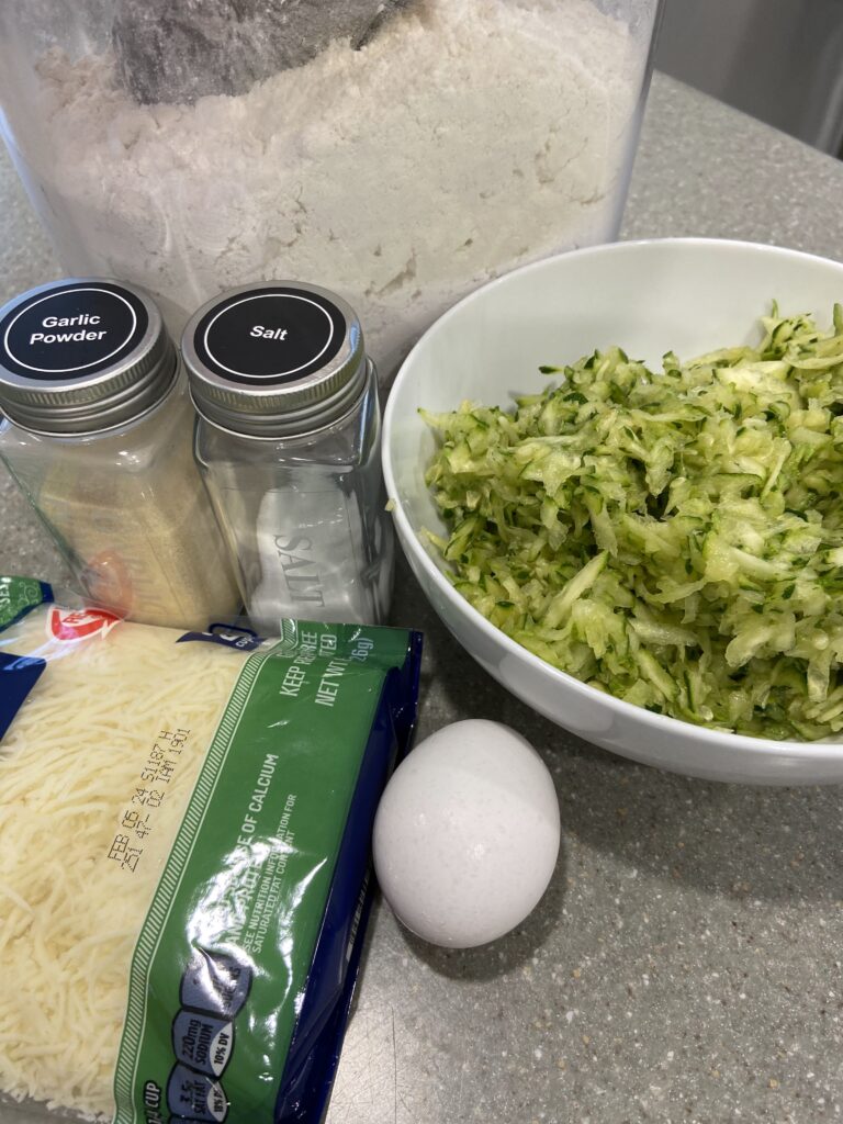 List of ingredients
flour, shredded zucchini, eggs, shredded cheese,, salt and pepper