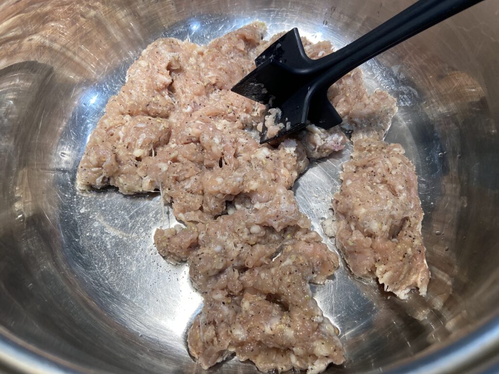 Ground chicken sausage sautéed in pot