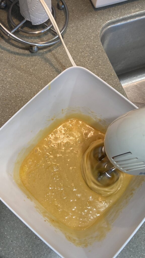 Mix the ingredients together with a hand mixer
