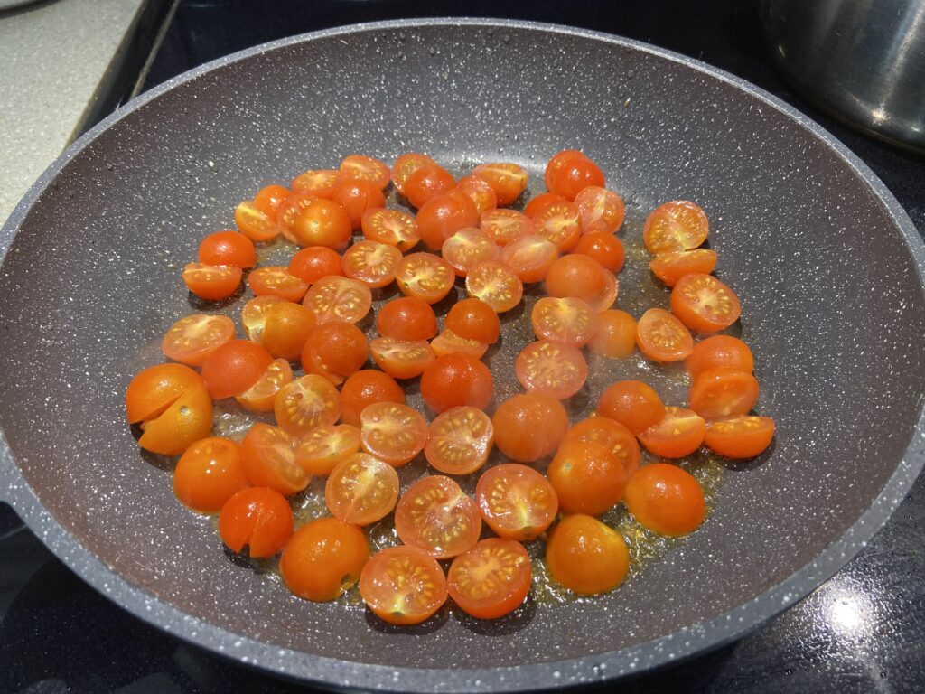 cherry tomatoes in a pan