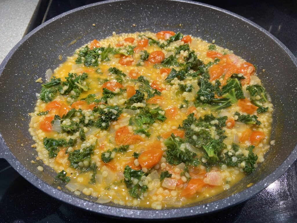 blistered cherry tomatoes with chopped onion and couscous and kale
salmon with kale