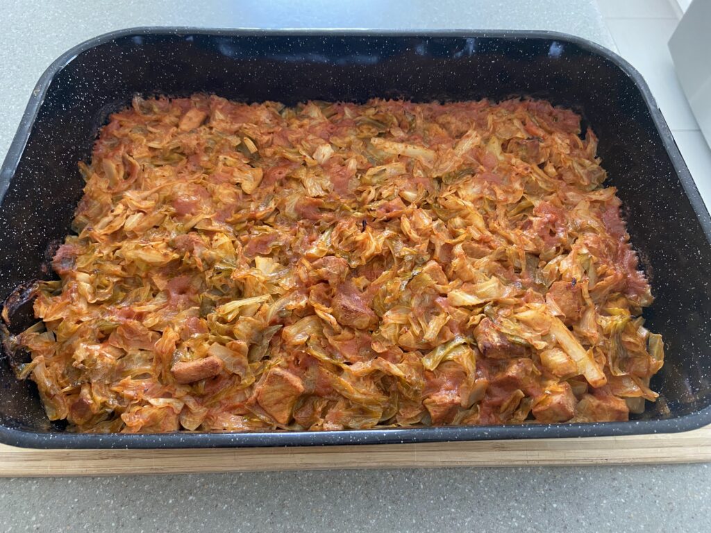 braised cabbage with pork that is stewed and then baked